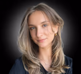 Mae's profile picture with a black background